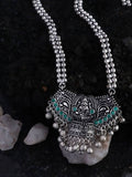 Laxmi Mata oxidised silver long necklace adorned with elegant green stones.