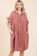 Woman wearing a lightweight mineral wash cotton gauze mini shirt dress with ruffle sleeve details.
