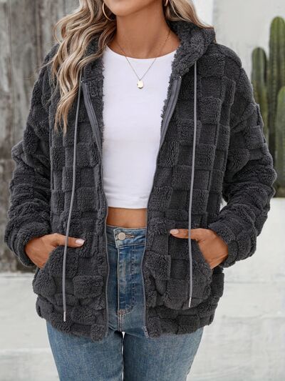 Dark gray fuzzy zip-up jacket with a checkered pattern and drawstring hem.