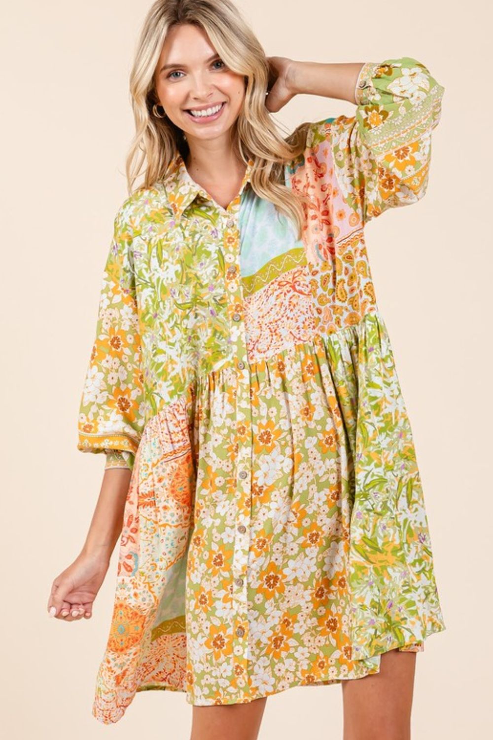 Floral print long sleeve shirt dress with button details and feminine silhouette