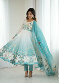 Aqua blue organza kurta with sequin embroidery paired with comfortable cotton trousers