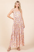 Floral print sleeveless maxi dress with empire waist and tiered hem.