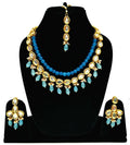 Traditional gold-plated Kundan jewelry set with stone detailing