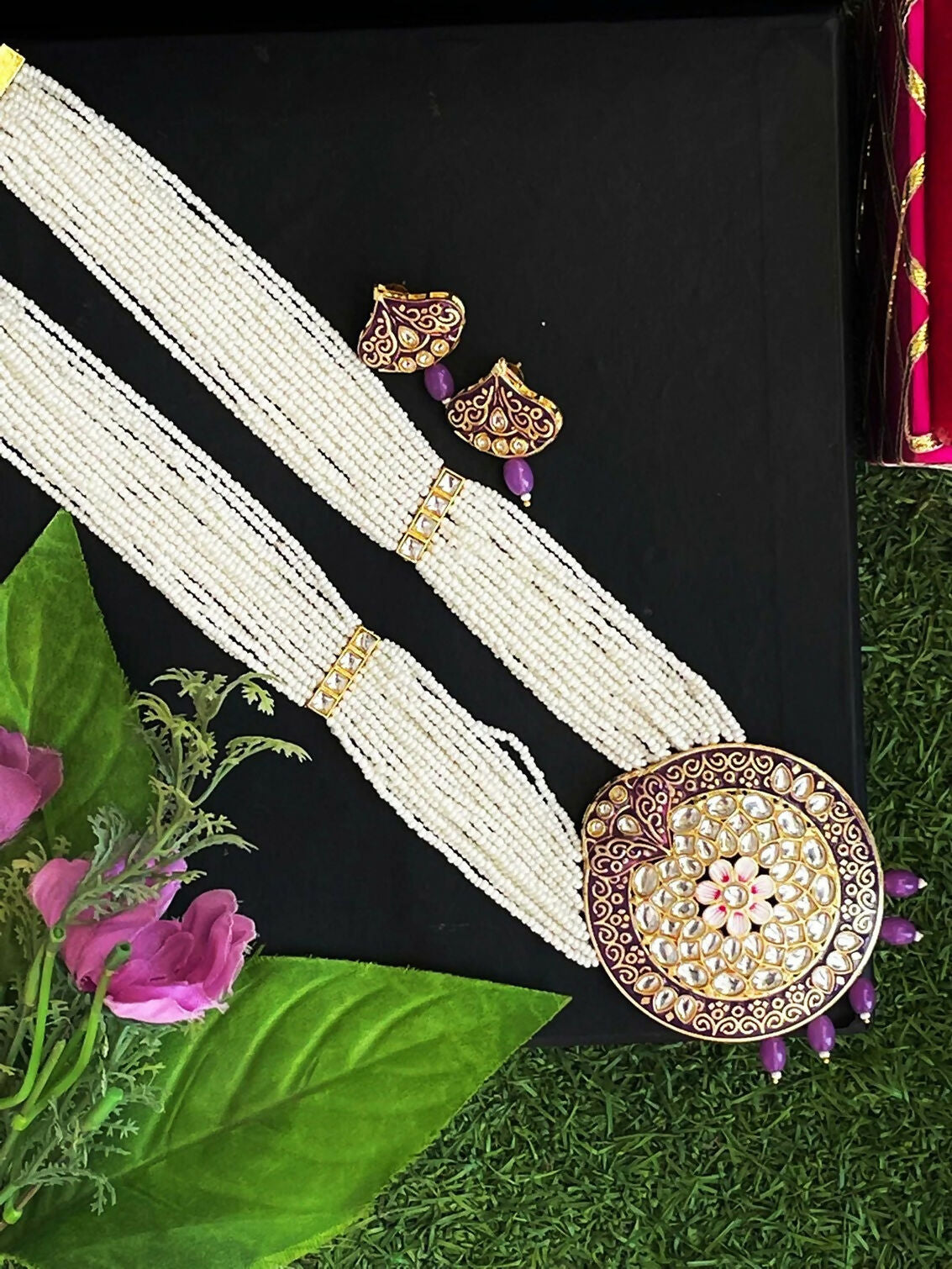 Elegant Meenakari necklace and earring set with purple enamel and gold accents