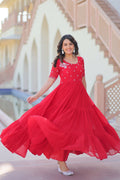 Red georgette gown featuring intricate sequence embroidery