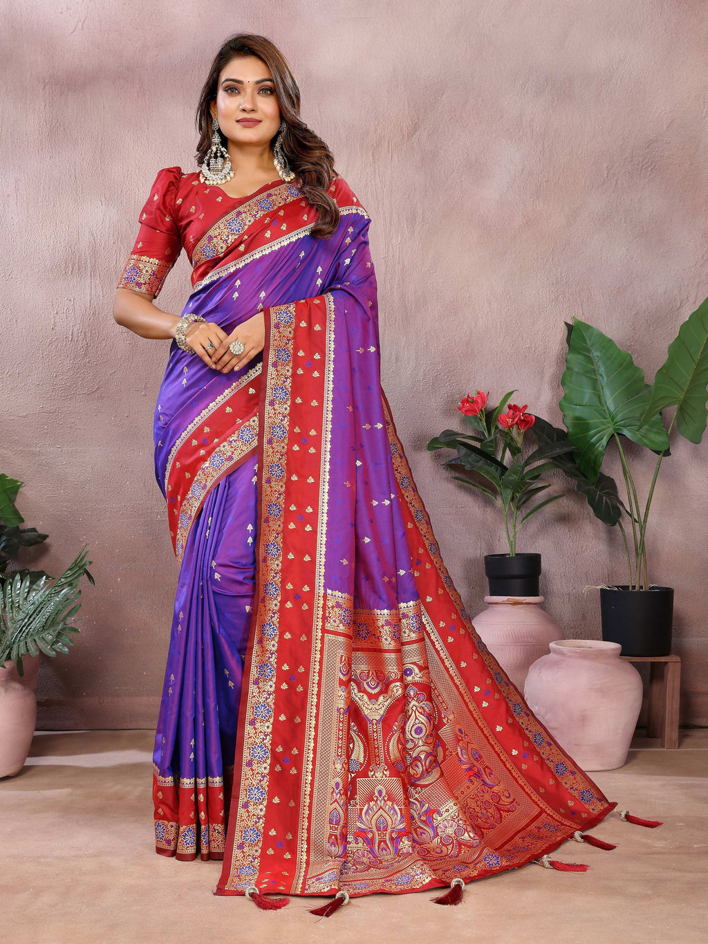 Purple Kalamkari silk saree with a detailed zari woven border.