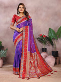 Purple Kalamkari silk saree with a detailed zari woven border.