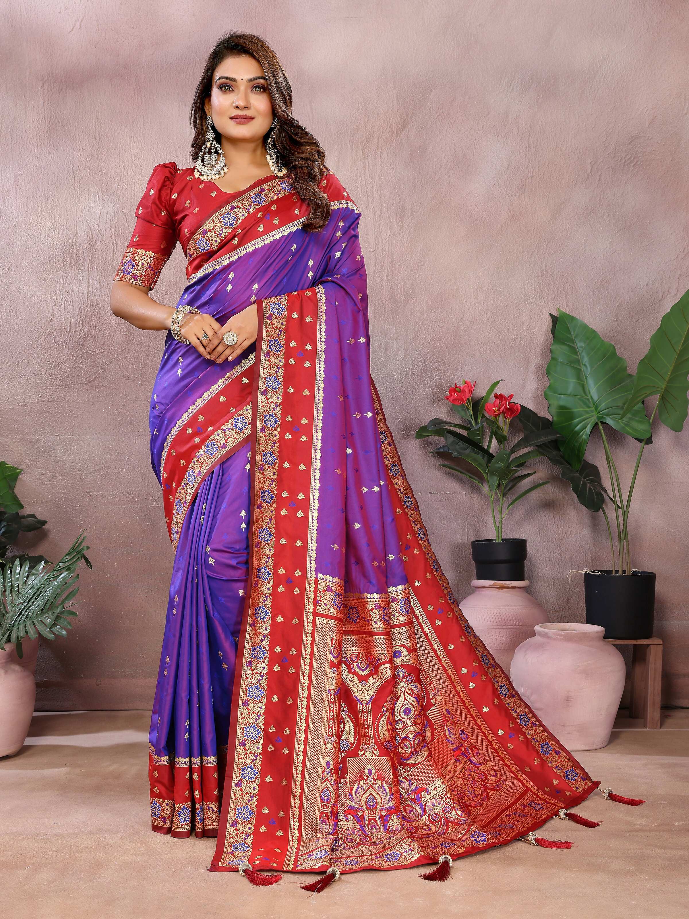 Purple Kalamkari silk saree with a detailed zari woven border.