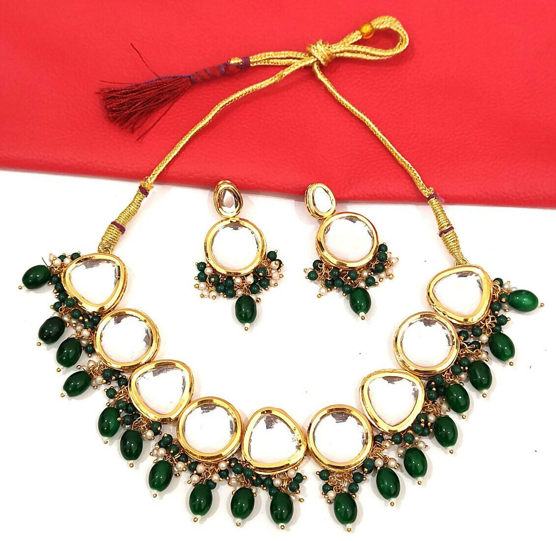 Exquisite gold-plated alloy Kundan jewelry set with intricate stone work
