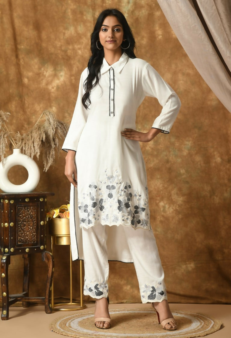 Clean and minimal white cotton rayon kurta set for women.
