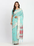A beautiful Sea Green linen cotton saree draped elegantly with matching blouse fabric