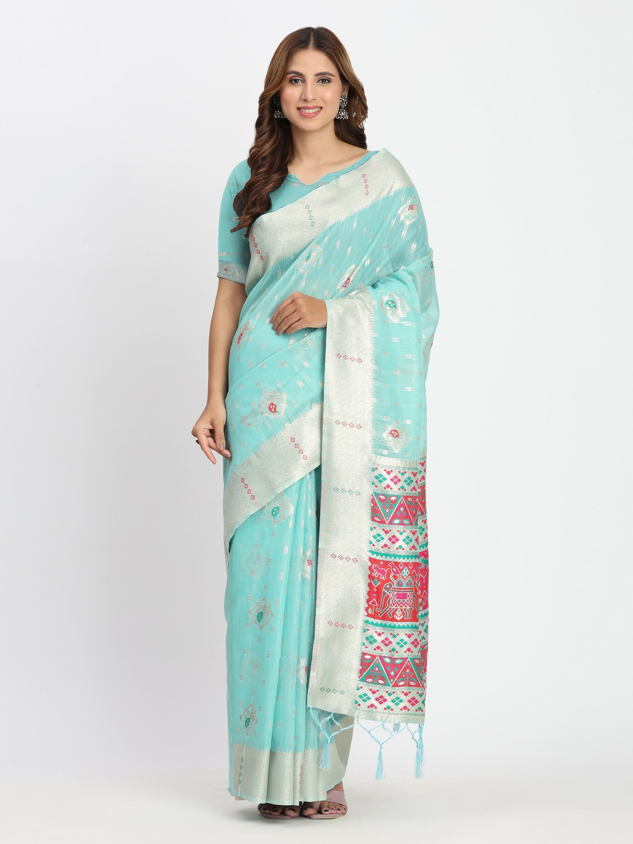 A beautiful Sea Green linen cotton saree draped elegantly with matching blouse fabric