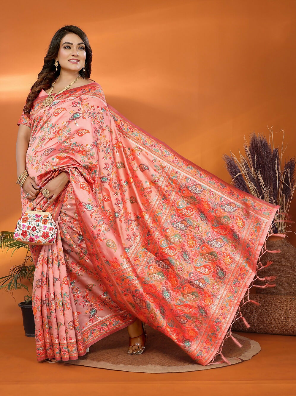 Peach Meena Weaves Pashmina Saree in silk blend fabric with matching unstitched blouse