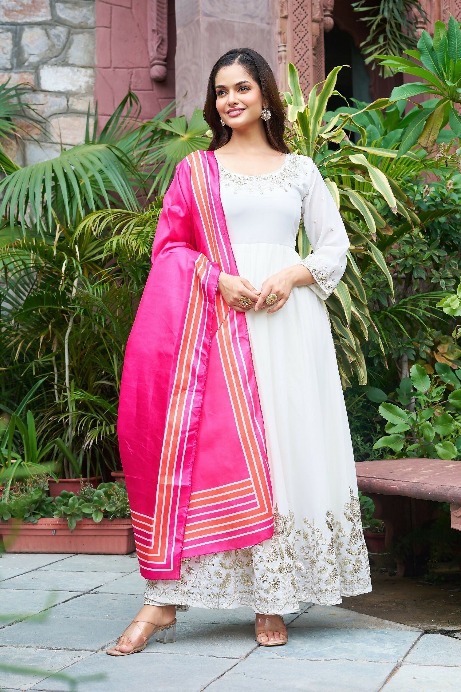 White georgette kurta set featuring embroidered patterns and sequence work