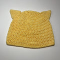 Cute yellow kids beanie with kitten ears, shown as a knitting or crochet DIY pattern project.