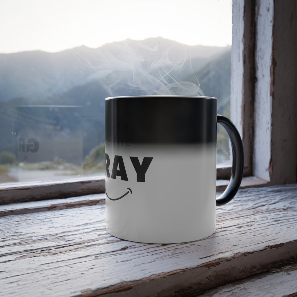 Seize the Gray color-morphing 11oz ceramic coffee mug on a clean, modern kitchen surface.
