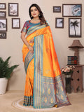 Orange Banarasi soft silk saree with small woven butti pattern and matching blouse piece.