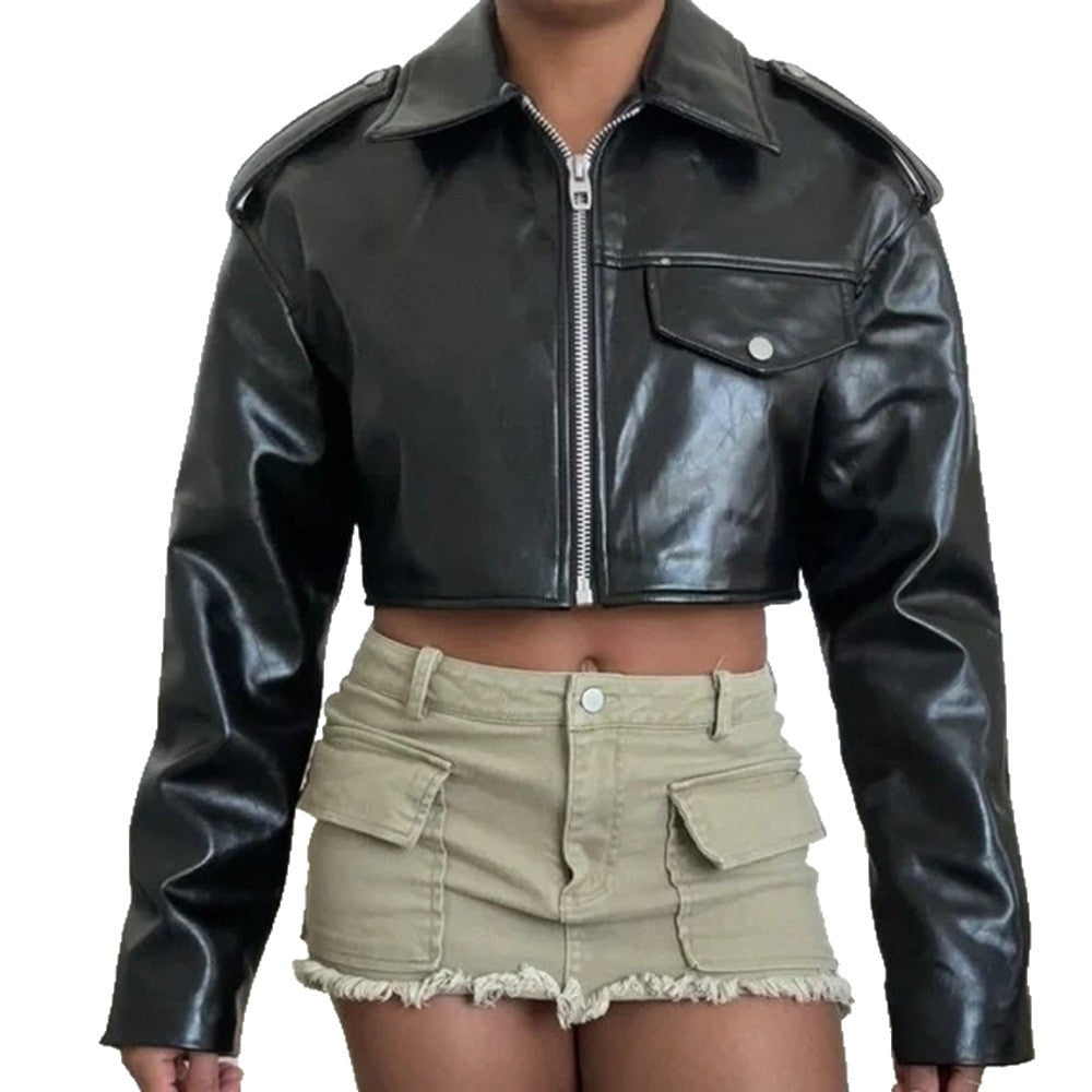 Model wearing a black cropped faux leather jacket with a flip collar and front zipper.