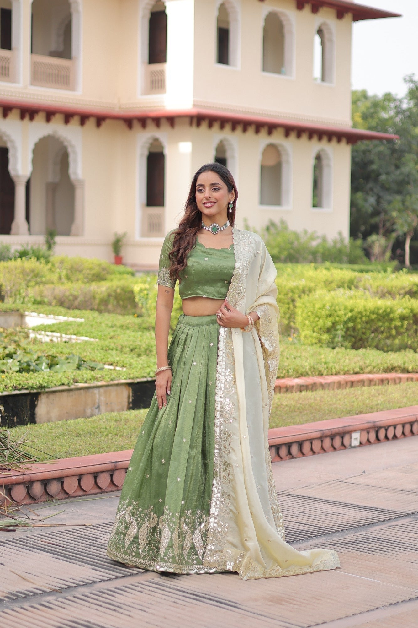 Parrot Green Gold Crush Lehenga Choli adorned with sequins and Zari embroidery.