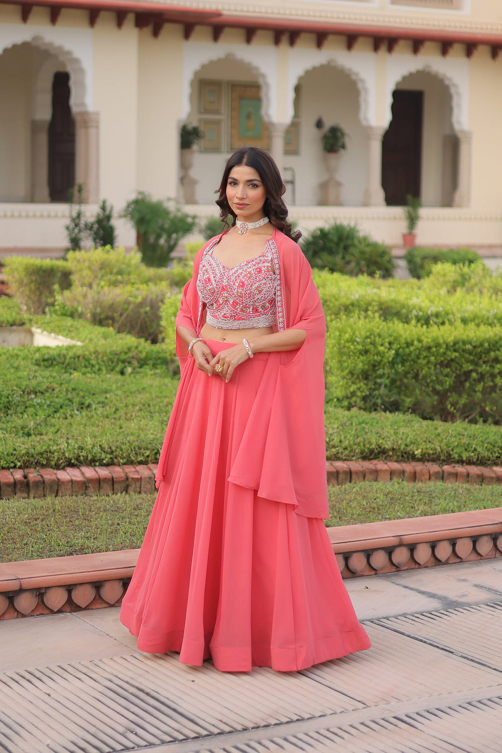 Peach Faux Georgette Lehenga Choli with Matching Shrug