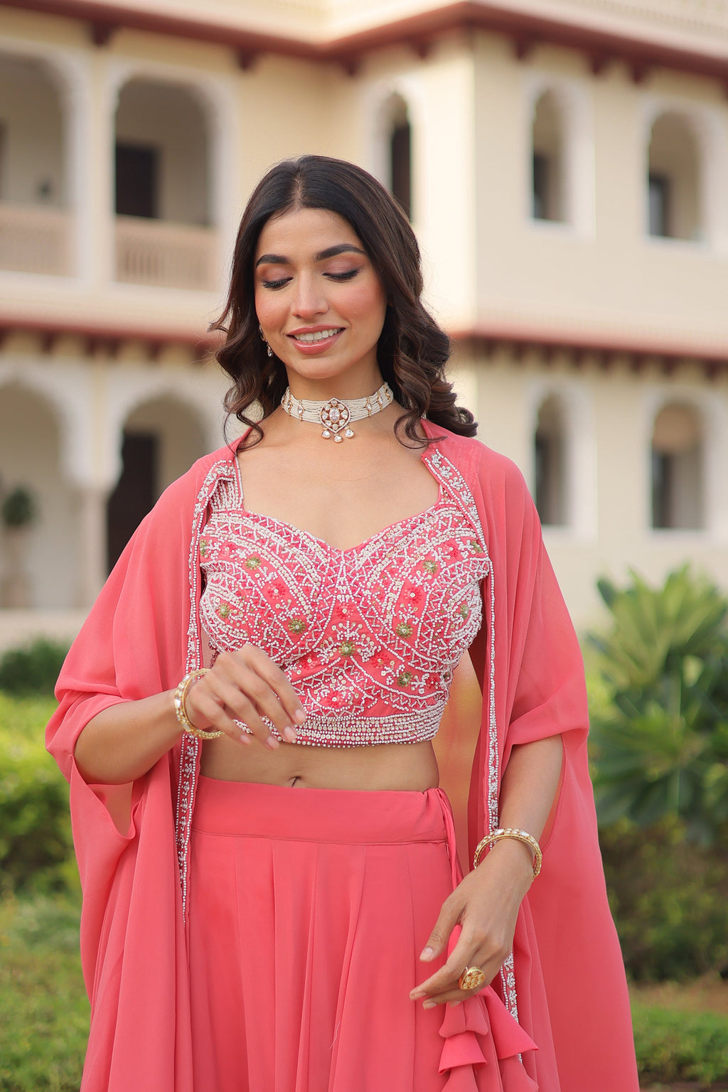 Peach Faux Georgette Lehenga Choli with Matching Shrug