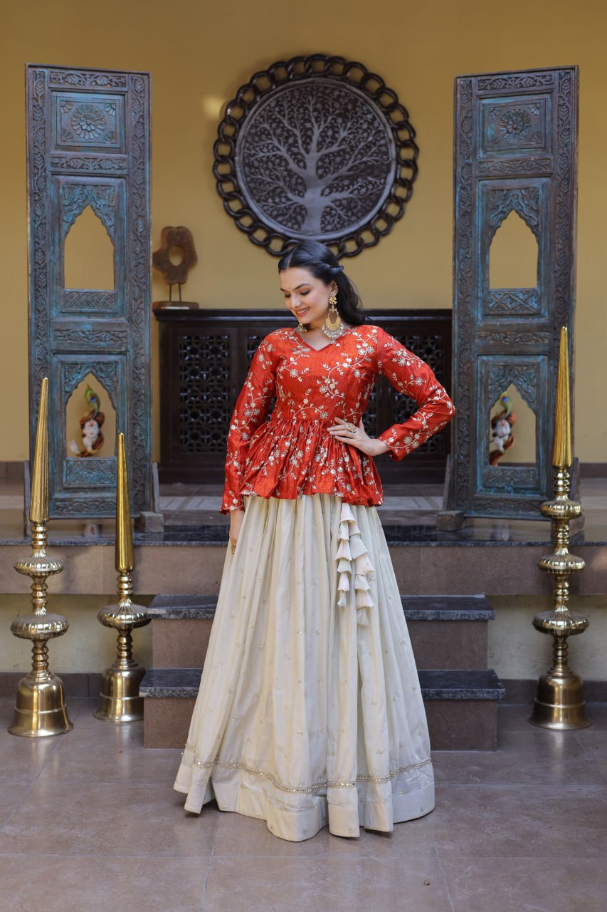 Offwhite lehenga choli with sequins, zari embroidery, and mirror lace work