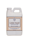 64 oz bottle of Le Blanc Linen Wash in White Flowers scent for luxury fabric care