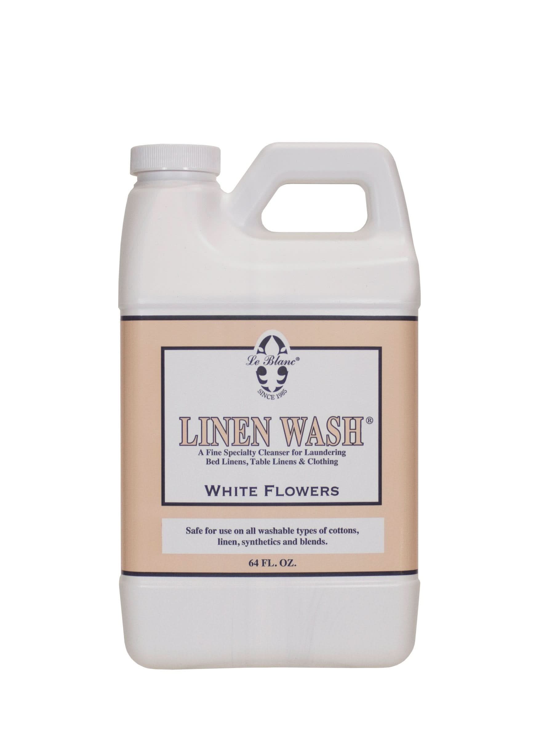 64 oz bottle of Le Blanc Linen Wash in White Flowers scent for luxury fabric care