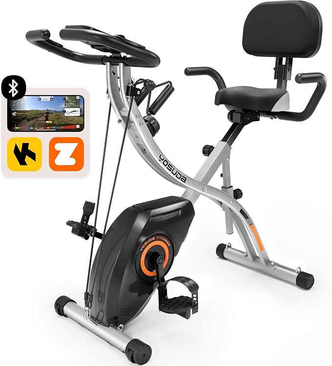 YOSUDA 5-in-1 foldable exercise bike with industrial silver frame and orange accents in a modern room setting