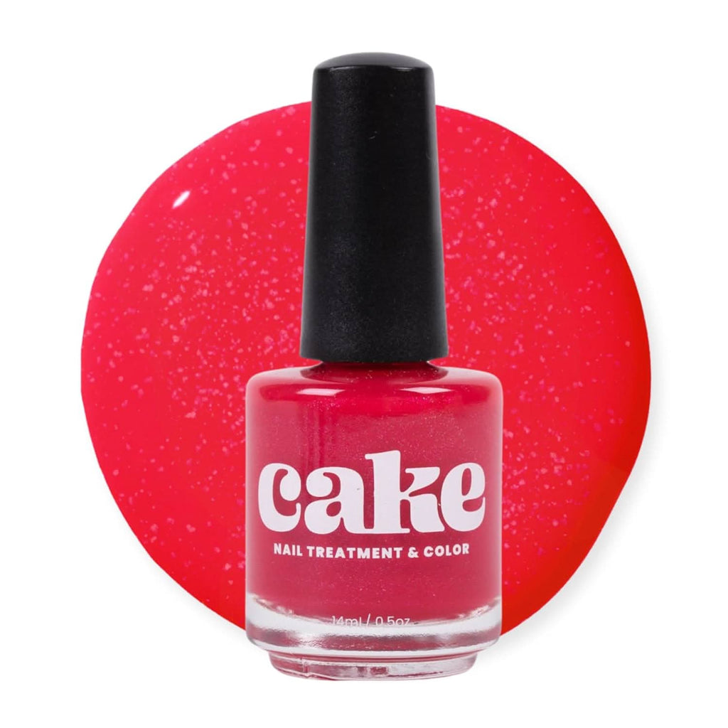 Sassy Senorita red nail polish bottle by CAKE, a long-wearing, strengthening formula.