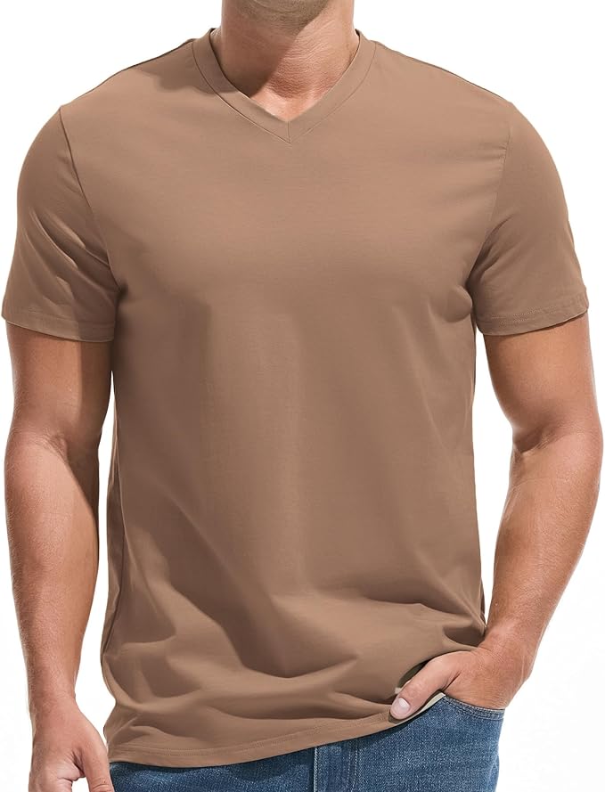 A man wearing a premium fitted modern V-neck t-shirt in a neutral color, showcasing the form-fitting cut.
