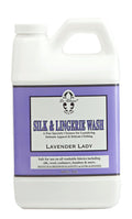 A 64 oz bottle of Le Blanc Lavender Silk & Lingerie Wash for delicate fabric care.