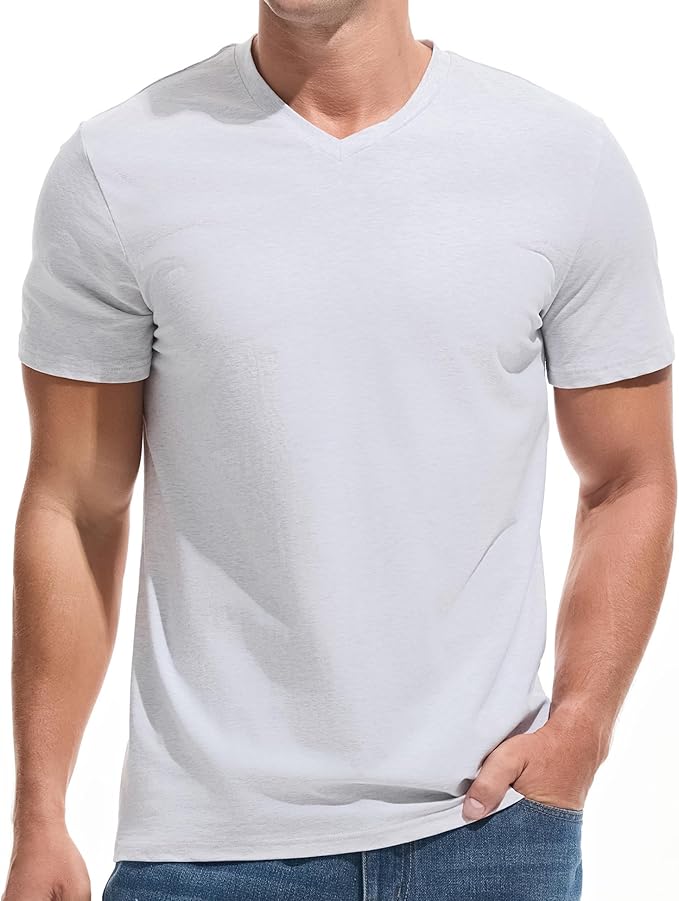 A man wearing a premium fitted modern V-neck t-shirt in a neutral color, showcasing the form-fitting cut.
