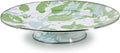 Modern Monet patterned enamelware cake plate displaying a baked dessert.