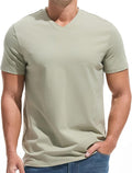 A man wearing a premium fitted modern V-neck t-shirt in a neutral color, showcasing the form-fitting cut.