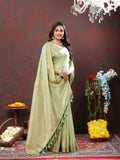Seagreen cotton saree with geometric gold zari weaving design