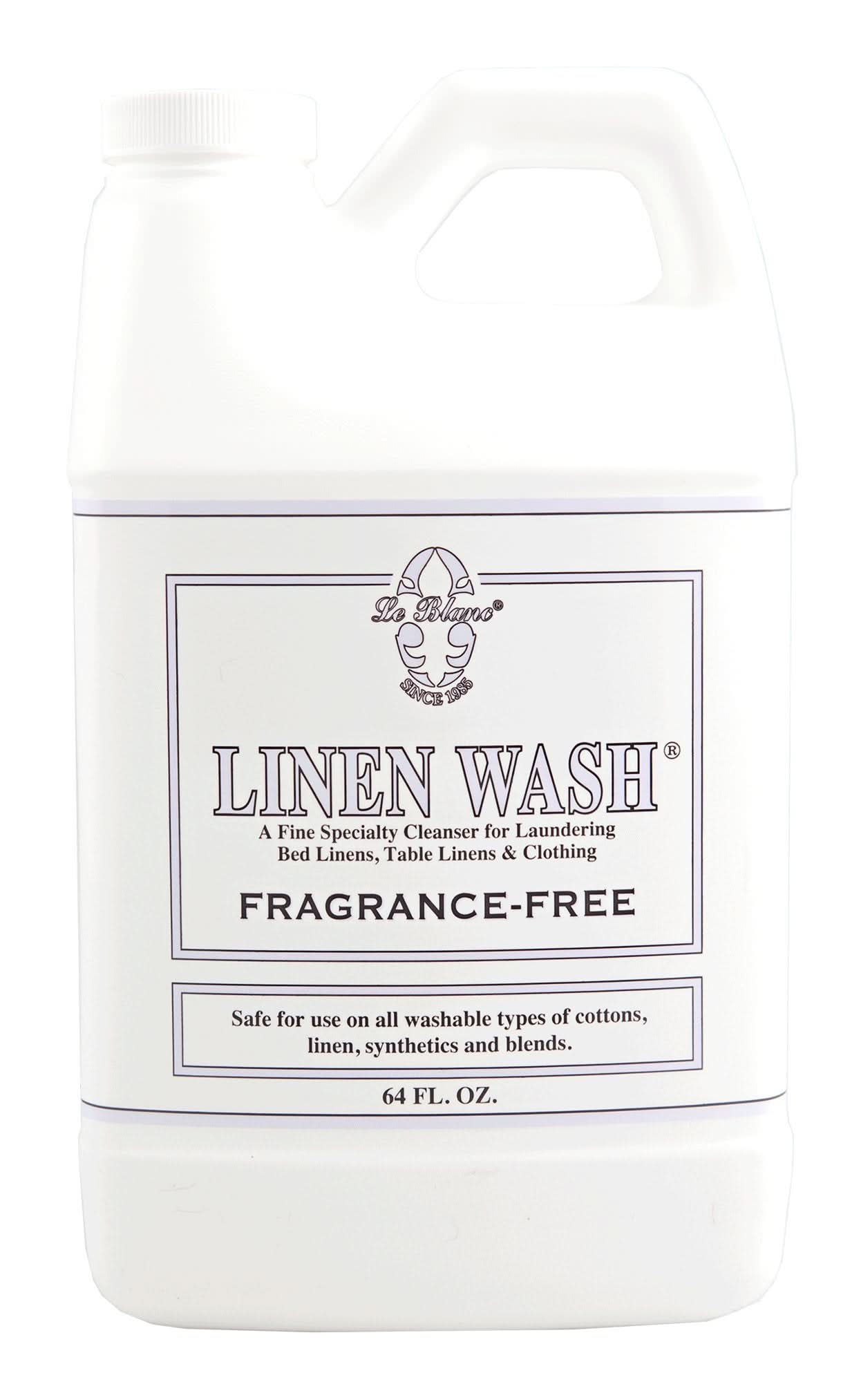 A 64 oz bottle of Le Blanc fragrance-free linen wash in minimalist white and purple packaging.