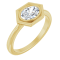 14K yellow gold ring featuring an oval white sapphire set in a clean, geometric gold frame.