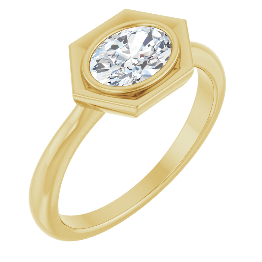 14K yellow gold ring featuring an oval white sapphire set in a clean, geometric gold frame.