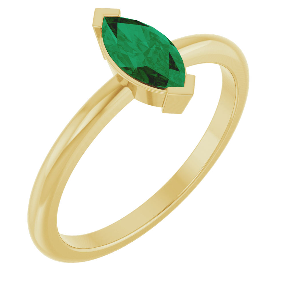 Marquise cut lab-grown emerald solitaire ring set in solid 14K yellow gold band