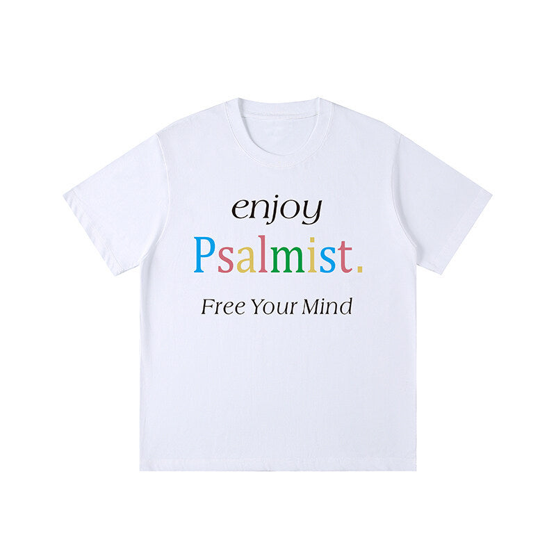 Front view of a white short-sleeve, loose-fit t-shirt featuring a multi-colored and black letter print that reads "enjoy Psalmist. Free Your Mind".