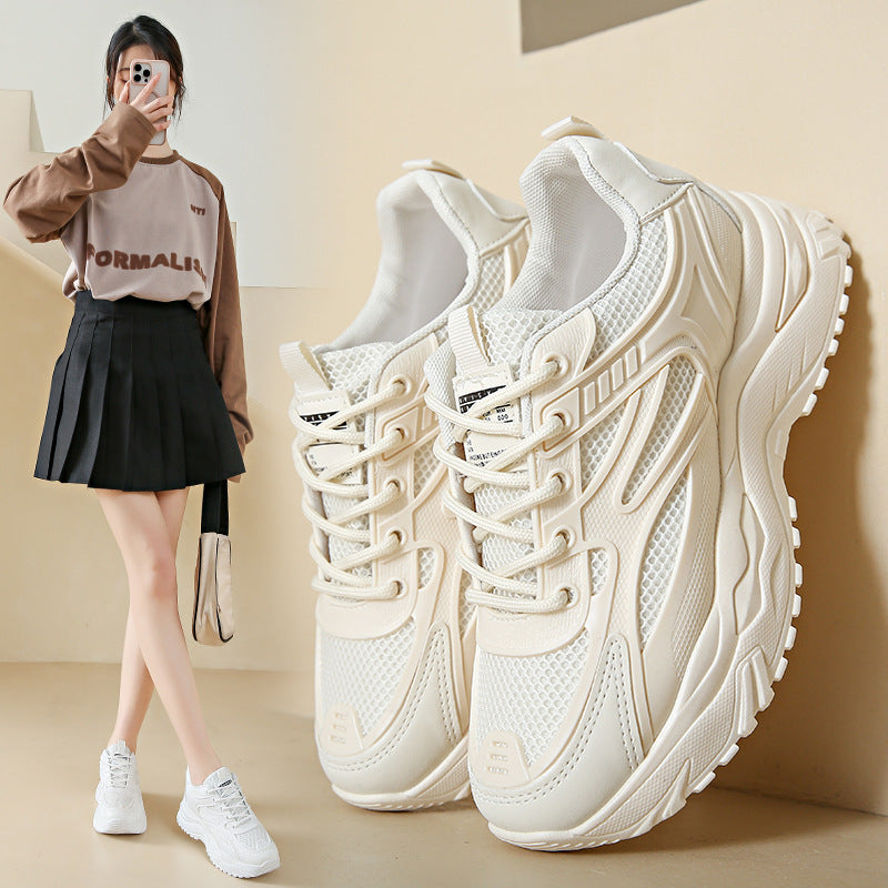 A pair of women's off-white chunky platform sneakers, shown both as a product shot and worn by a model in a casual outfit.