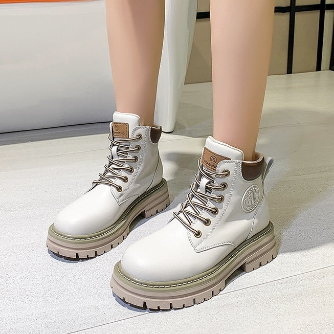 Women's genuine leather Martin boots in white and tan, featuring a platform lug sole and lace-up design.