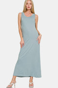A simple scoop neck tank dress with wide straps in a classic, versatile design.