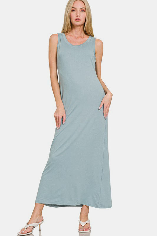 A simple scoop neck tank dress with wide straps in a classic, versatile design.