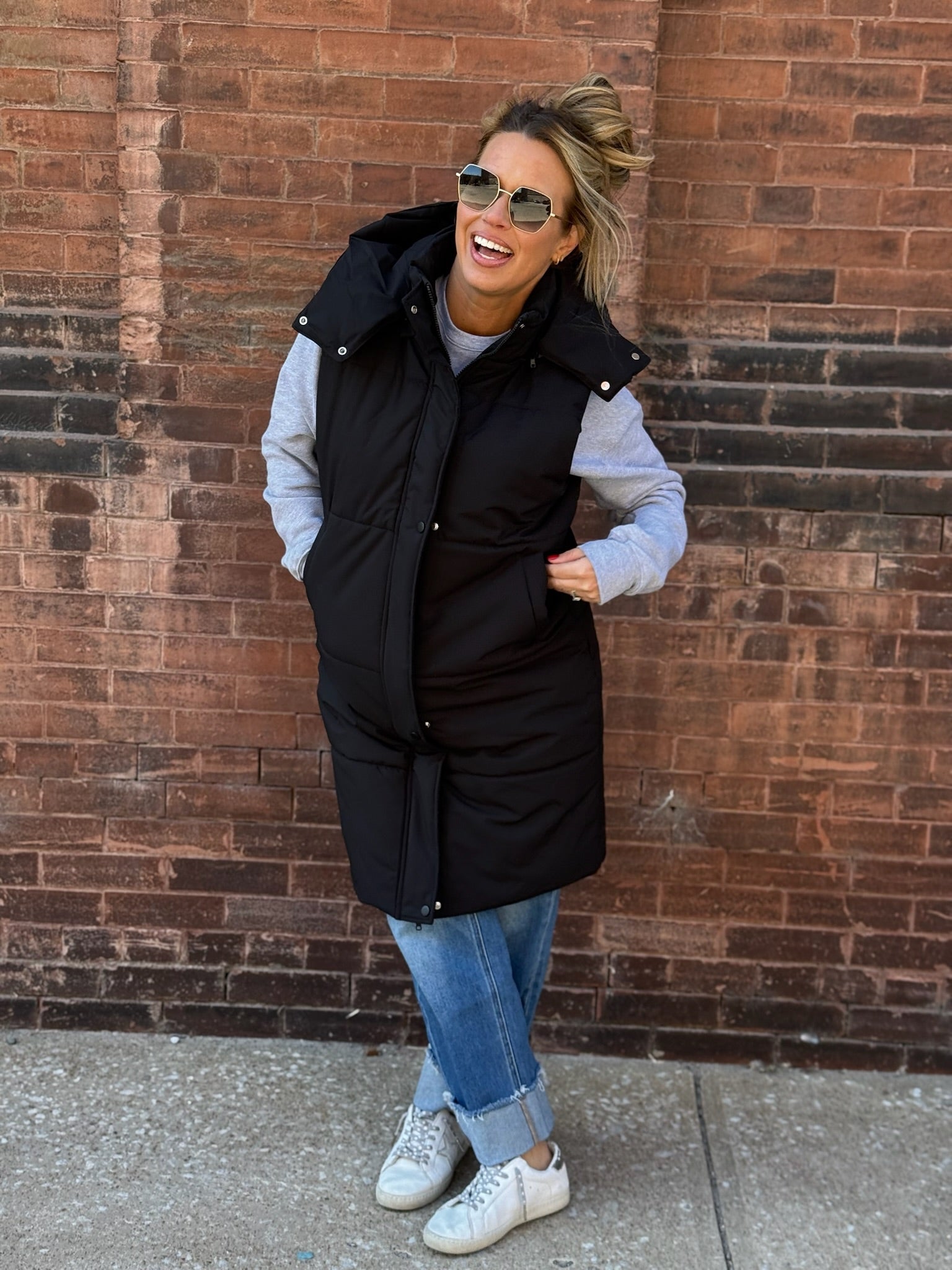 Long Black Puffer Vest with Removable Hood and Dual Closure