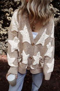 Close-up of a person wearing a beige and white star patterned button-up cardigan with pockets