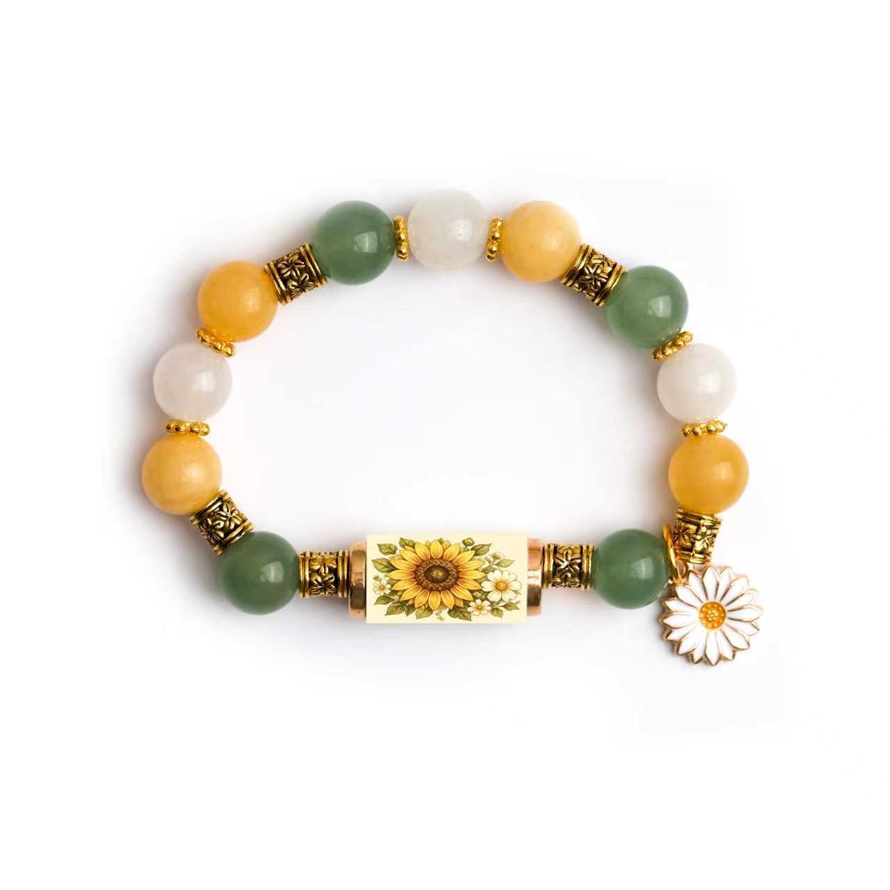 Vera Lux gold plated bracelet featuring a delicate white chalcedony cross charm