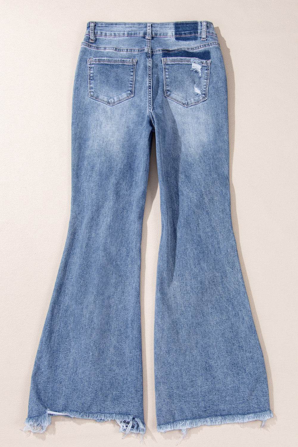 Dusk Blue High Rise Flared Jeans with Ripped Distressed Hem