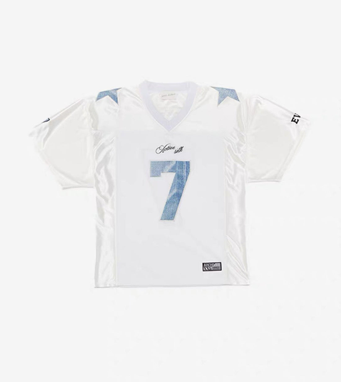 Women's Harajuku style white short sleeve digital mesh t-shirt with light blue number 7 and star print, shown on a flat lay and worn by a model outdoors.